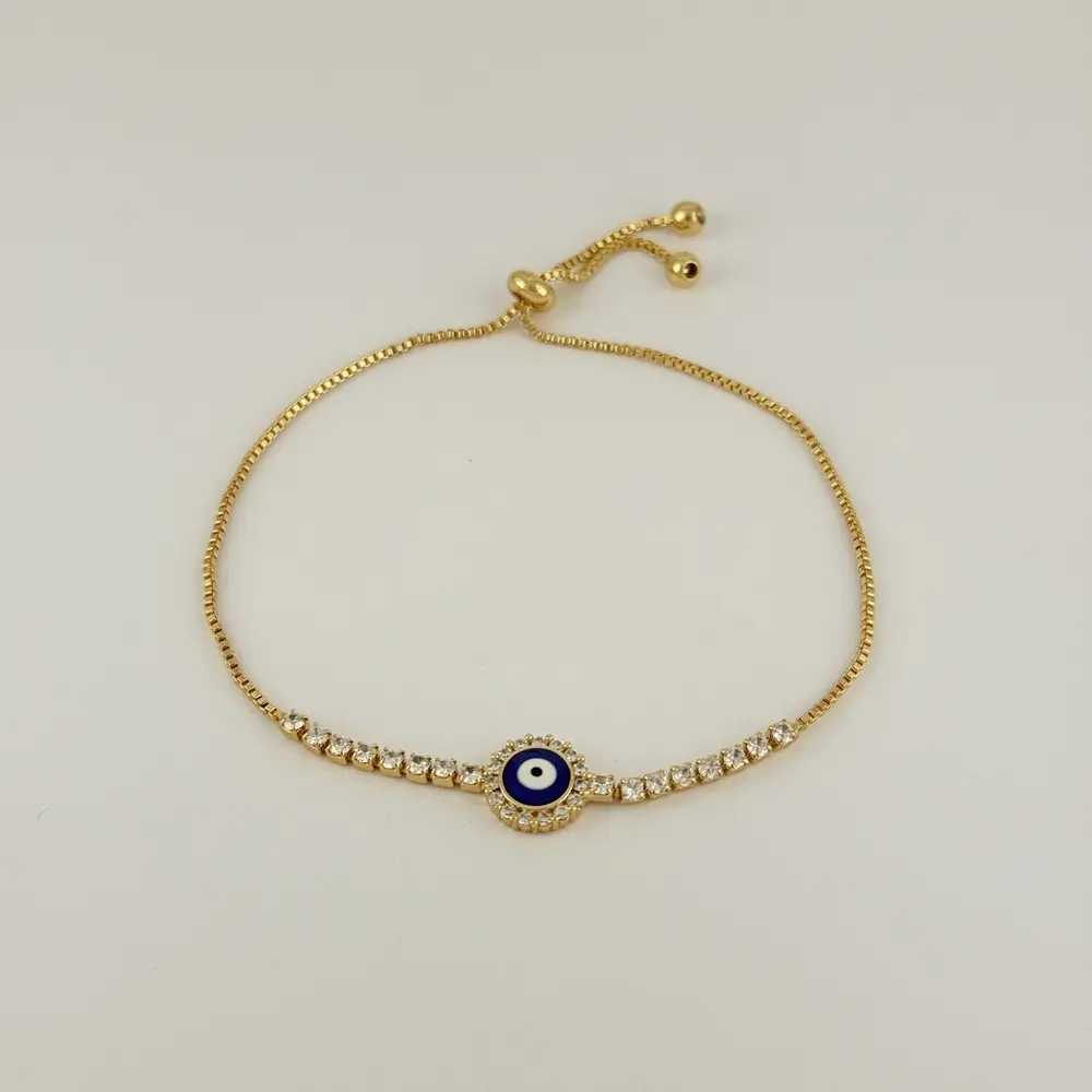 Pulsera en Rodinado Gold Champagne ajustable ojito azul microcirconia