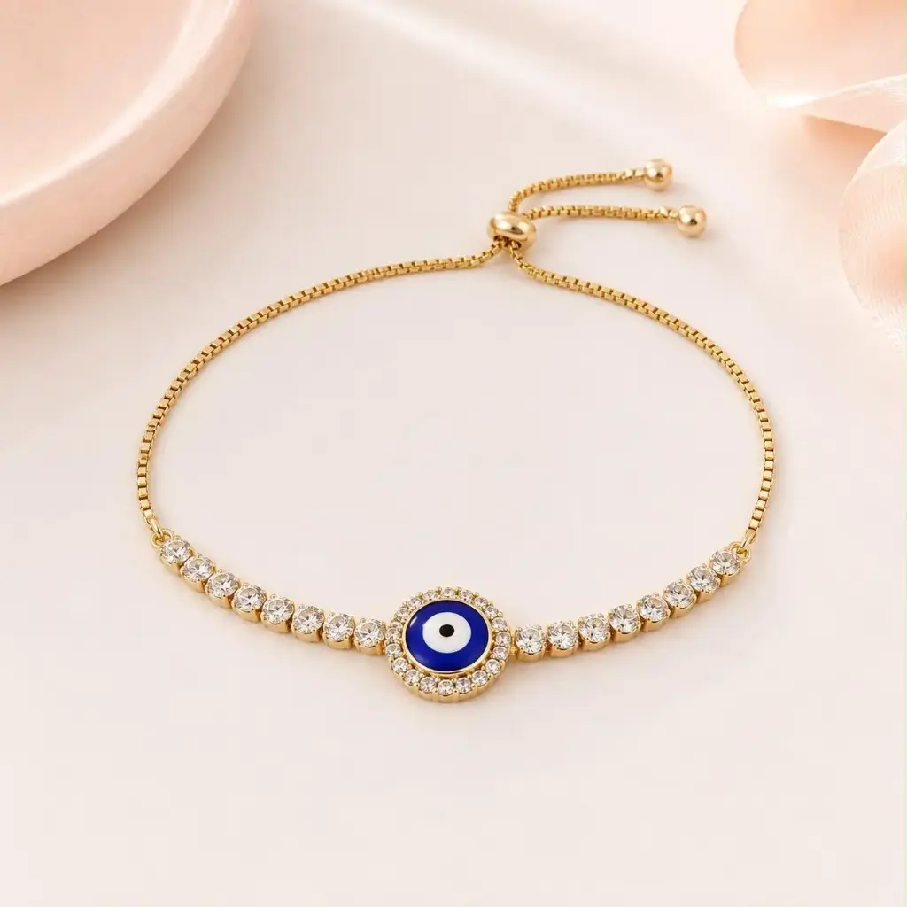 [G-PL-235] Pulsera en Rodinado Gold Champagne ajustable ojito azul microcirconia