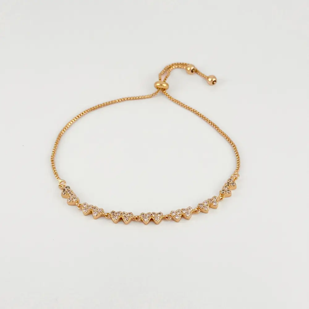 Pulsera en Rodinado Gold Champagne ajustable circón corazones verticales