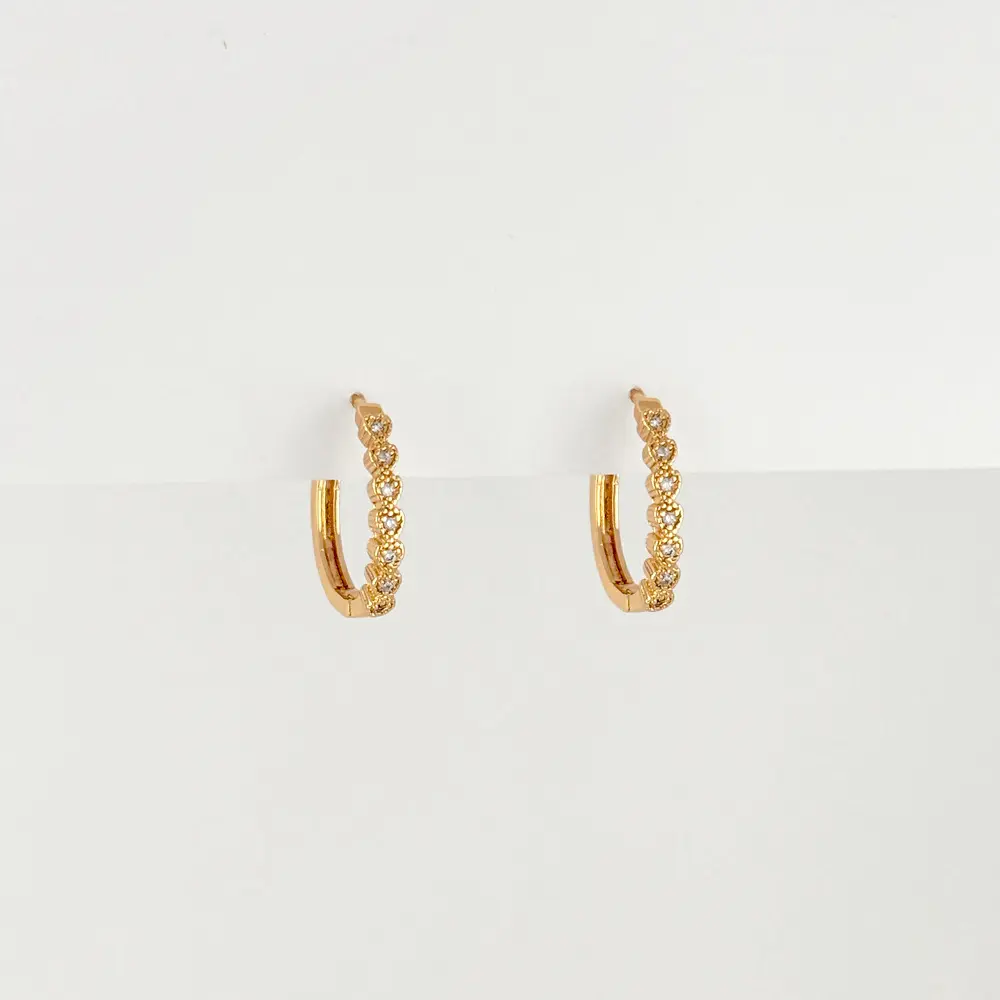 Aretes en Rodinado Gold Champagne corazones circones 2 cm