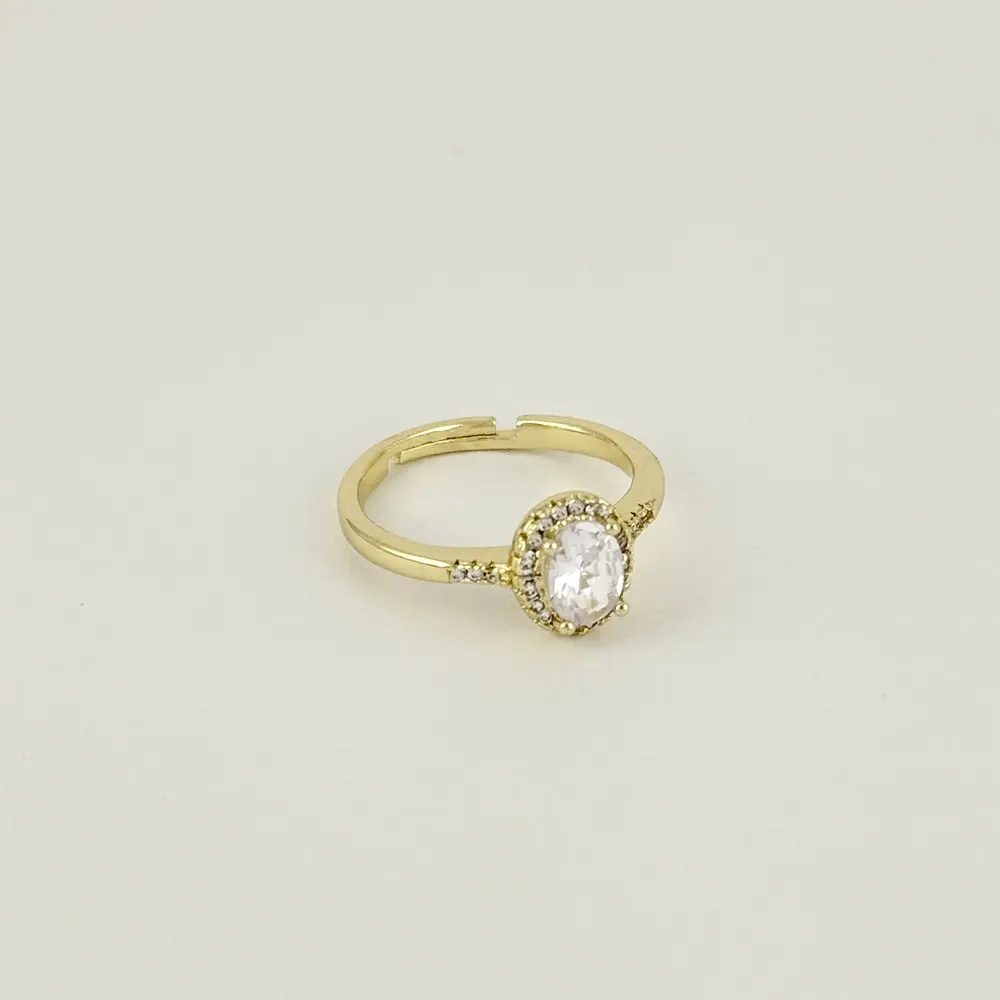 Anillo ajustable en rodinado gold cristal ovalado blanco estilo pandora