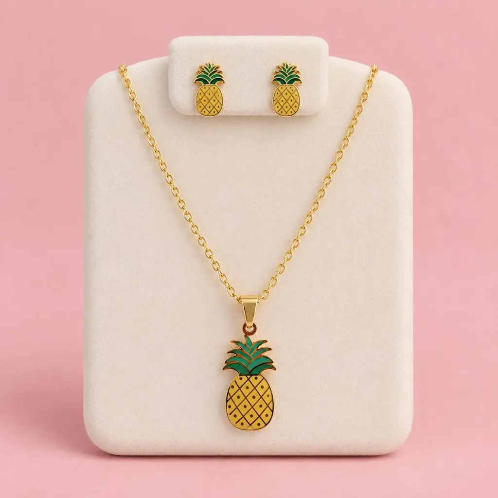 [AC-JU-226] Set esmaltado en acero gold figura piña