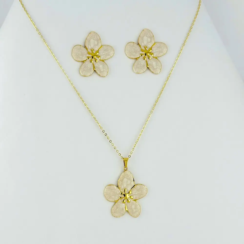 Juego en acero gold flor esmaltada