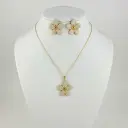 Juego en acero gold flor esmaltada
