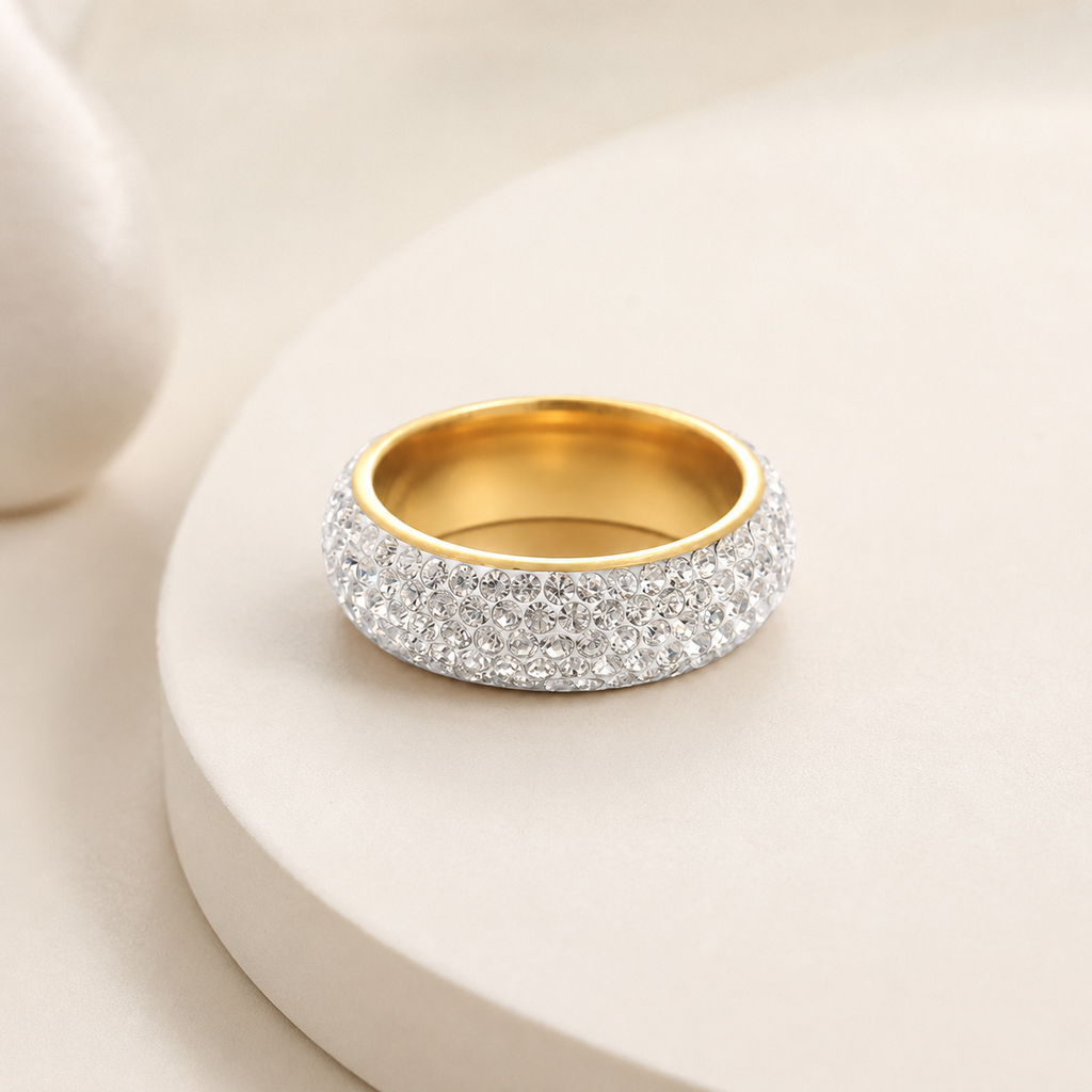 Anillo en acero gold cinco lineas circones blancos