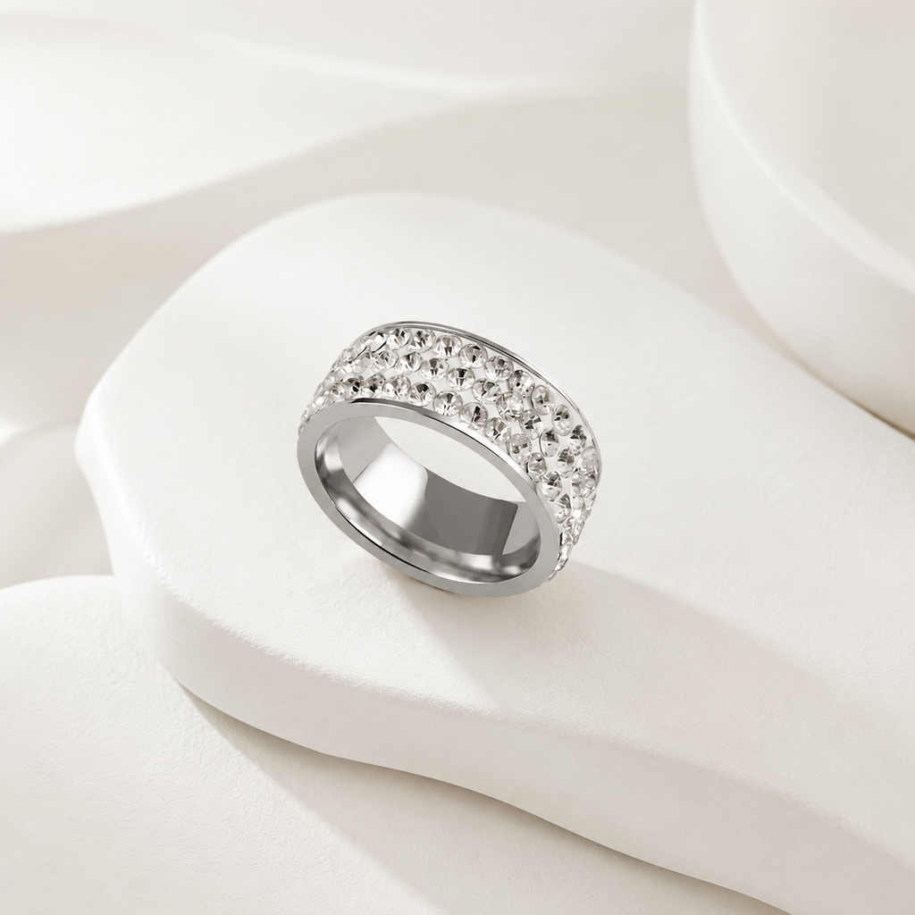 Anillo en acero silver aro cuatro lineas microcircones blancos