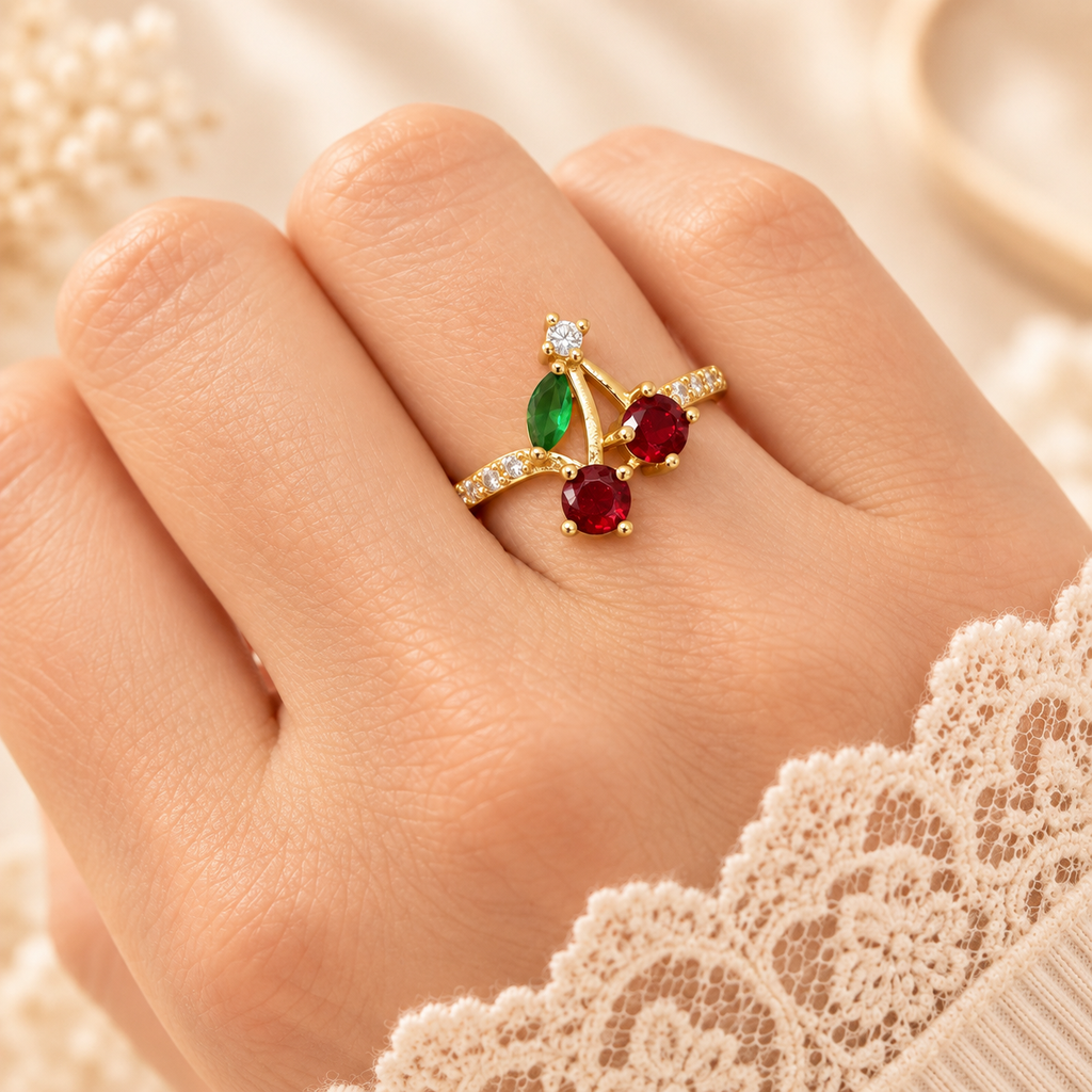 Anillo en rodinado gold cherry cristales