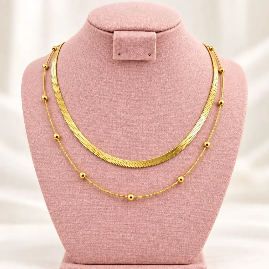 Collar en Acero Inoxidable dorado doble cadena serpiente / bolitas