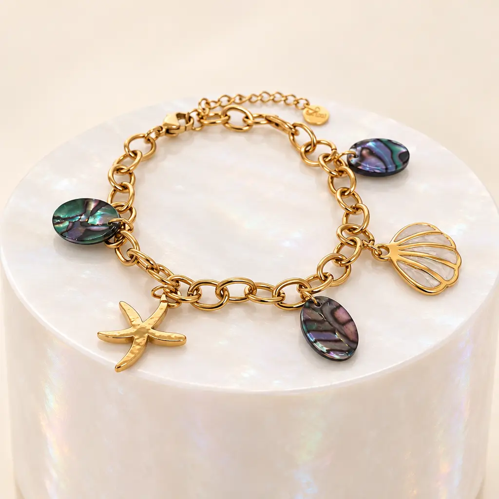 Pulsera en Acero Inoxidable dorada dijes marinos charms amatista