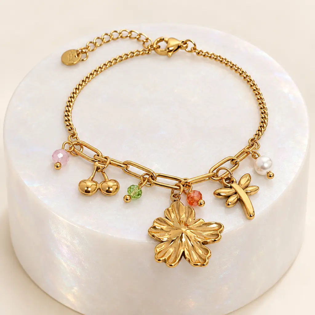 Pulsera en Acero Inoxidable dorada dijes charms flores