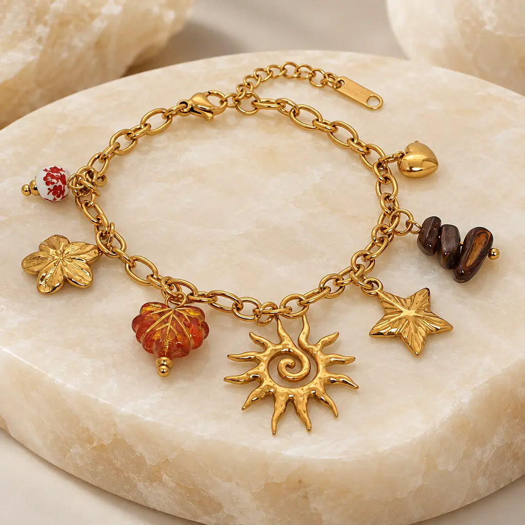 Pulsera en Acero Inoxidable dorada dijes charms sol