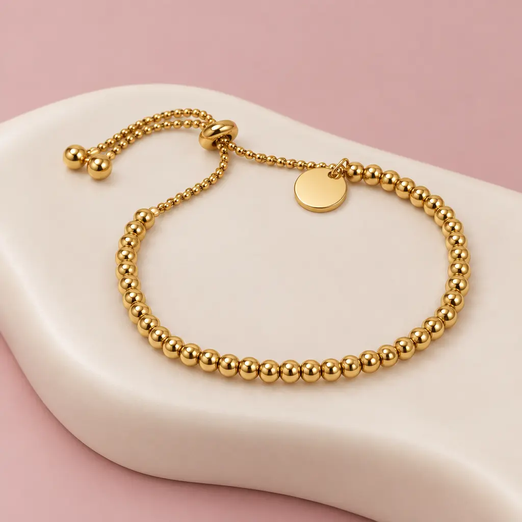 Pulsera en Acero Inoxidable dorada ajustable bolitas