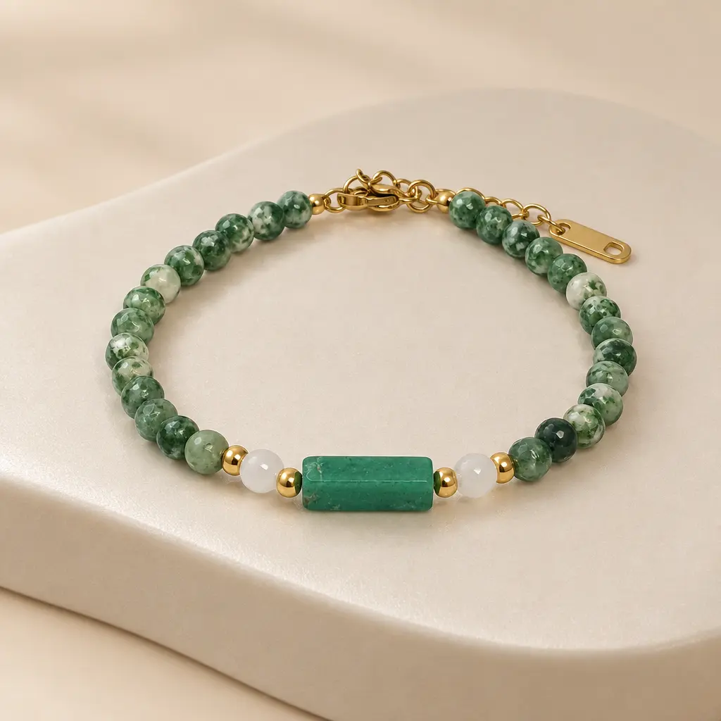 Pulsera en Acero Inoxidable dorada piedras verdes