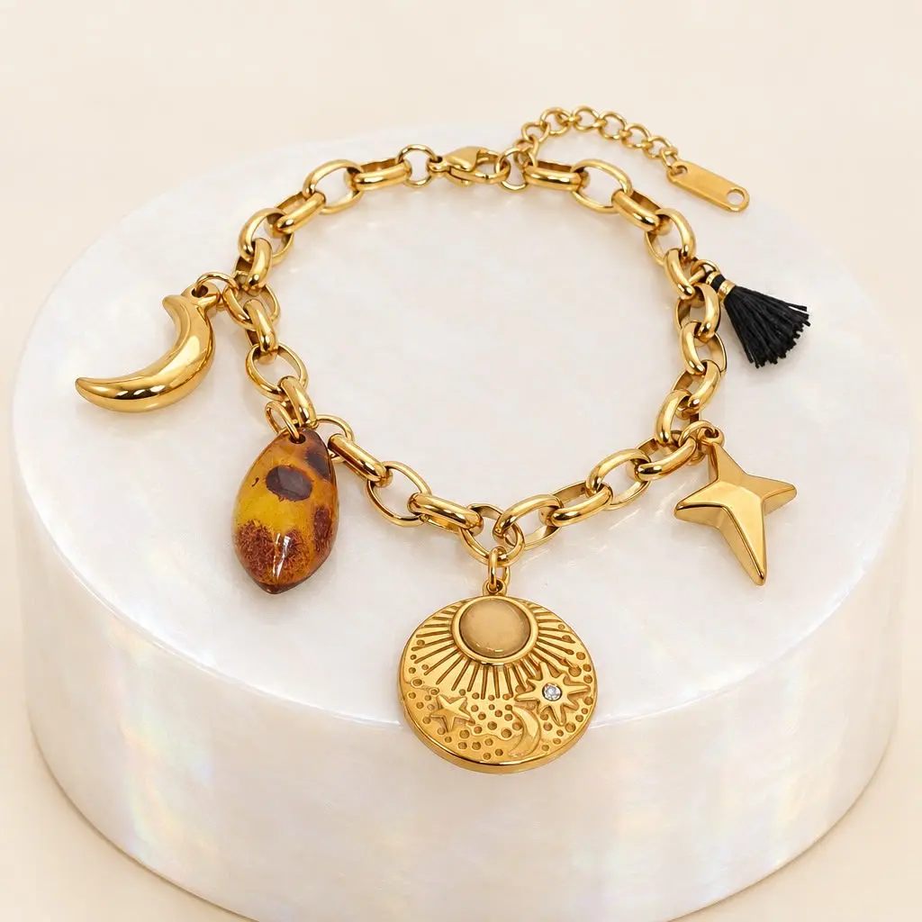 Pulsera en Acero Inoxidable dorada dijes charms constelación