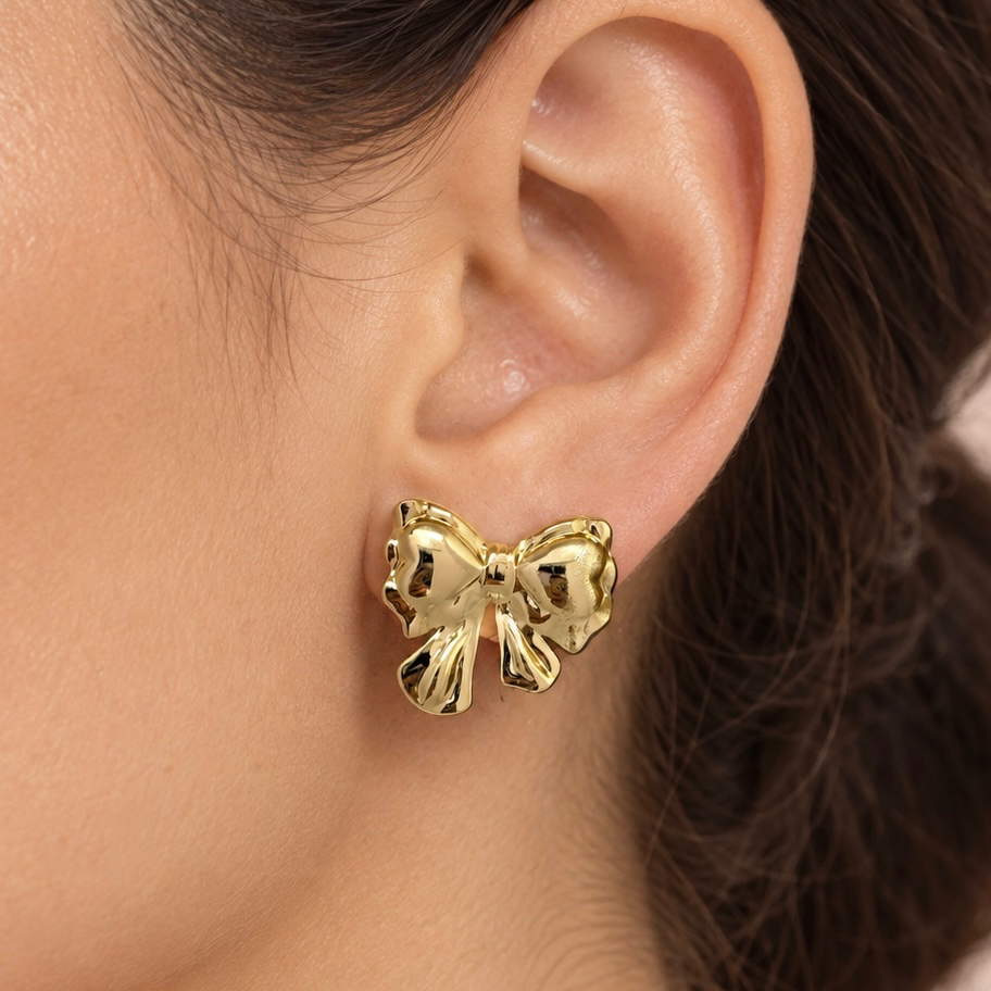 Arete en Acero Inoxidable gold moño
