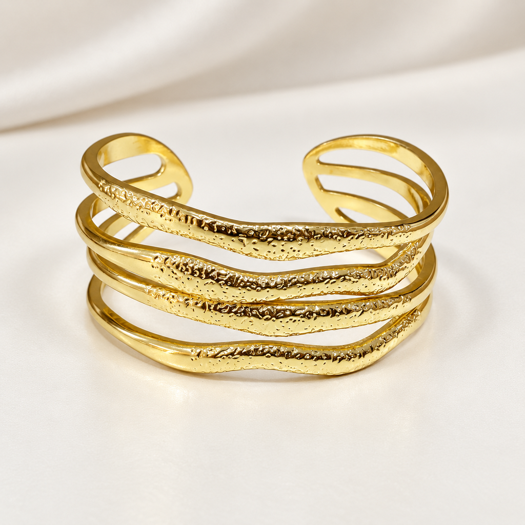 Brazalete rigido en Acero Inoxidable dorado