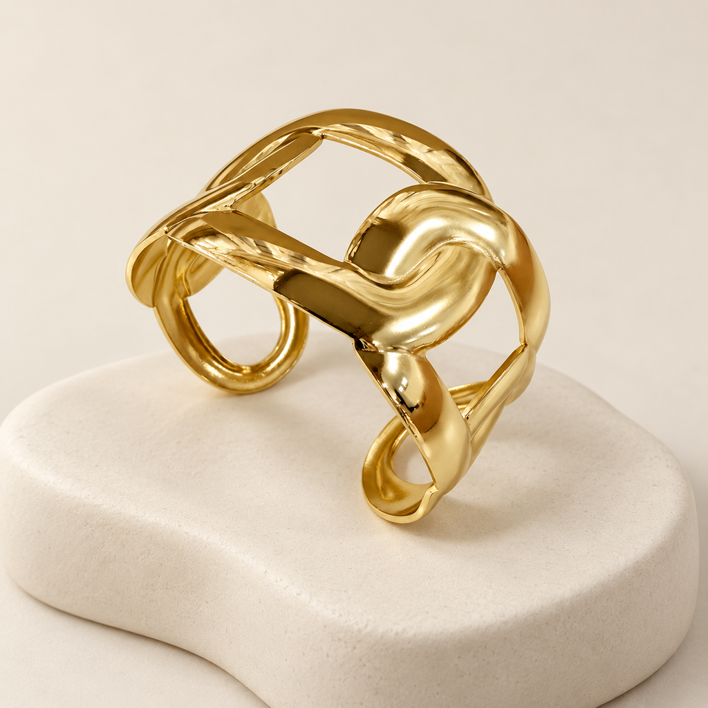 Brazalete rigido en Acero Inoxidable dorado