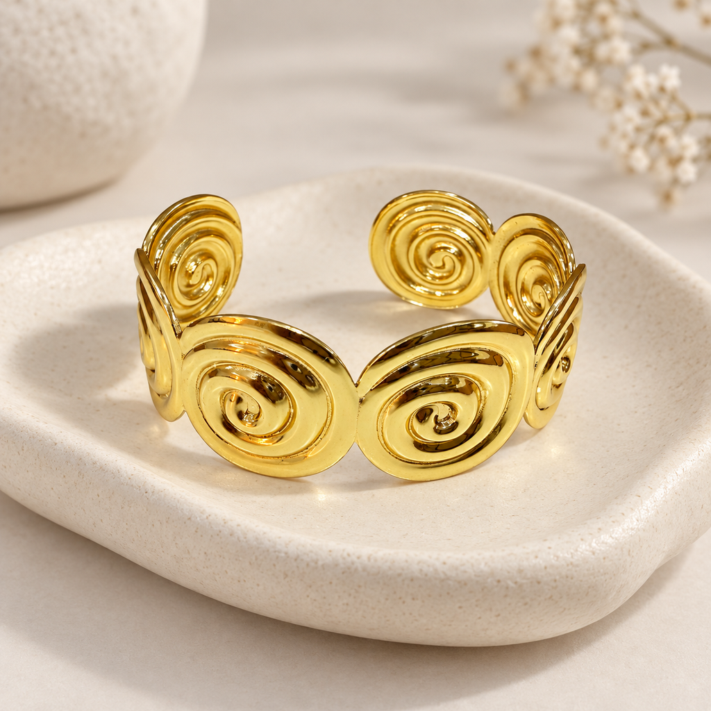 Brazalete rigido en Acero Inoxidable dorado
