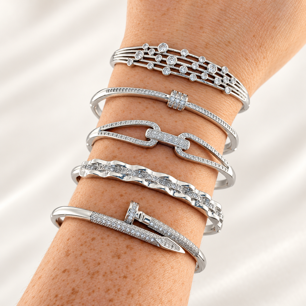Brazalete rigido en baño de rodio silver microcirconia cúbica / modelos surtidos 