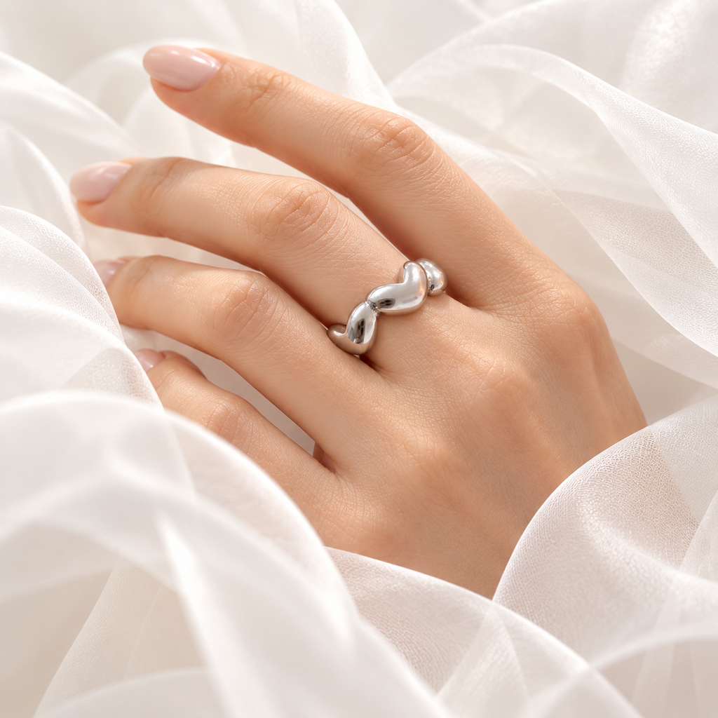 [AC-AN-425] Anillo en acero inoxidable plateado premium corazones 316L (6)