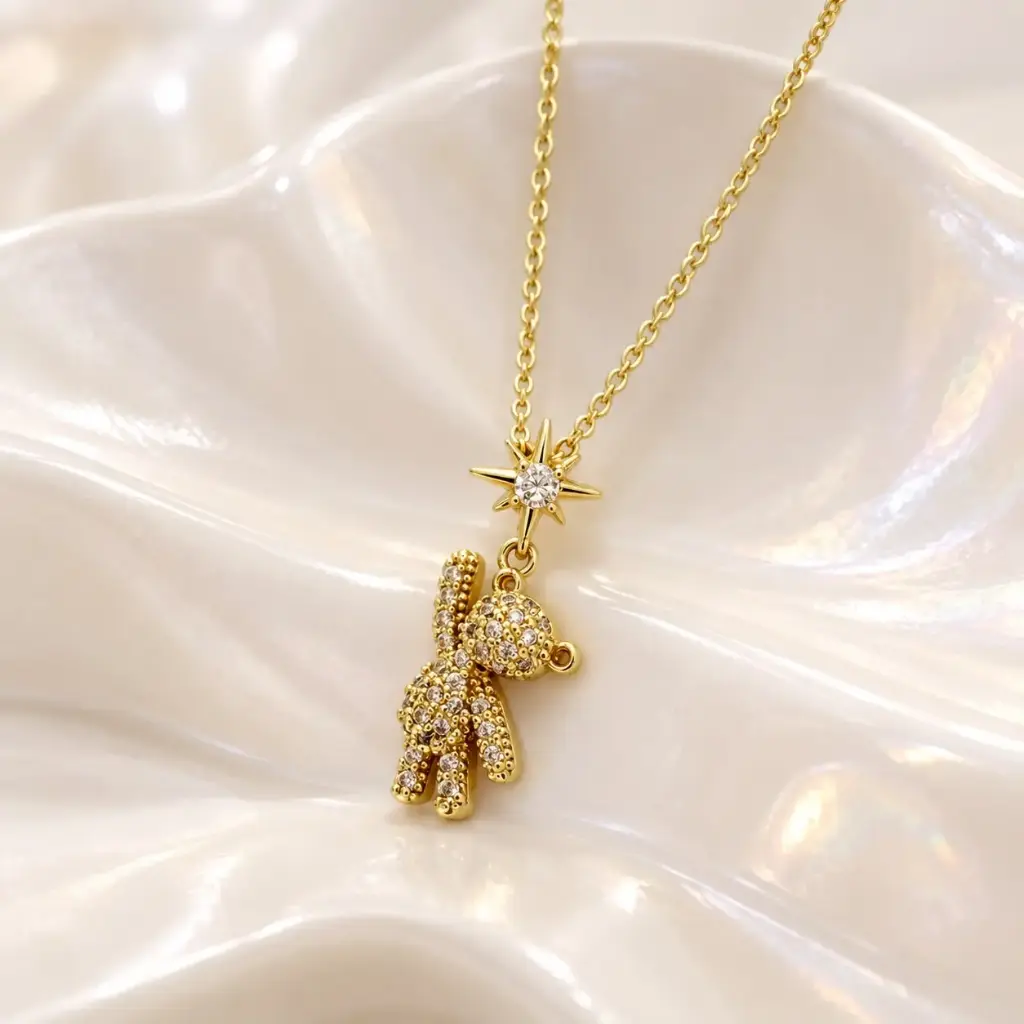 Collar en baño de oro rodinado dorado oso microcircones cadena bolitas