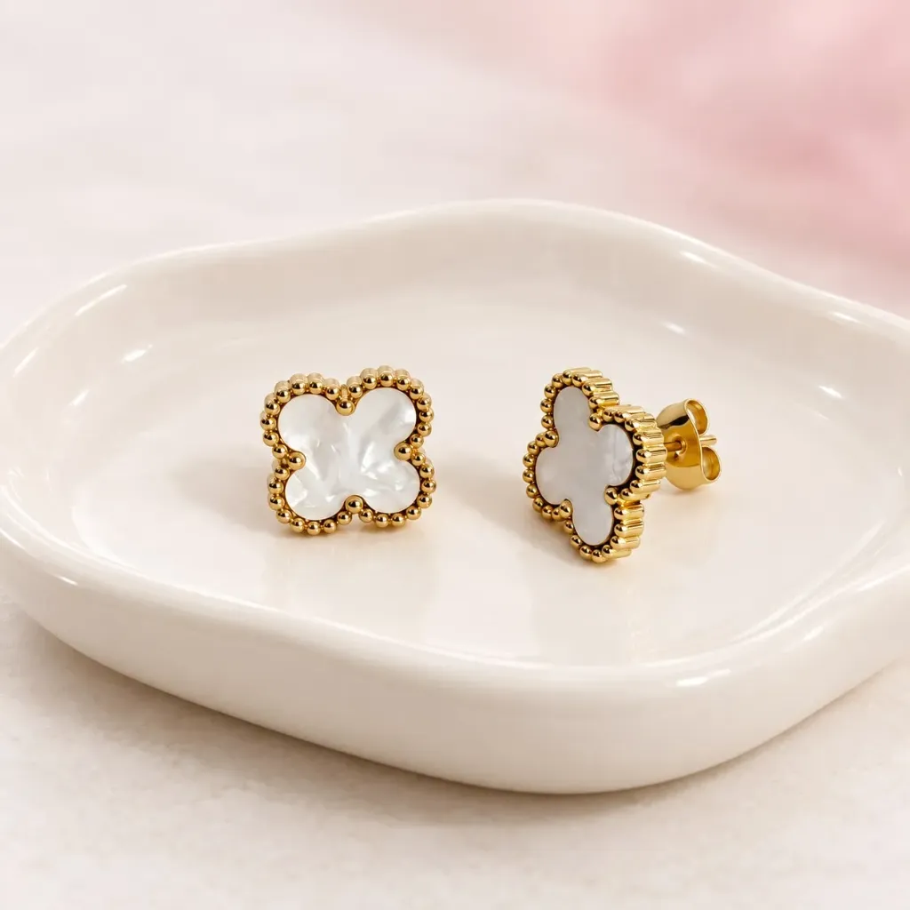 Topos en acero inoxidable dorados flor carey blanco
