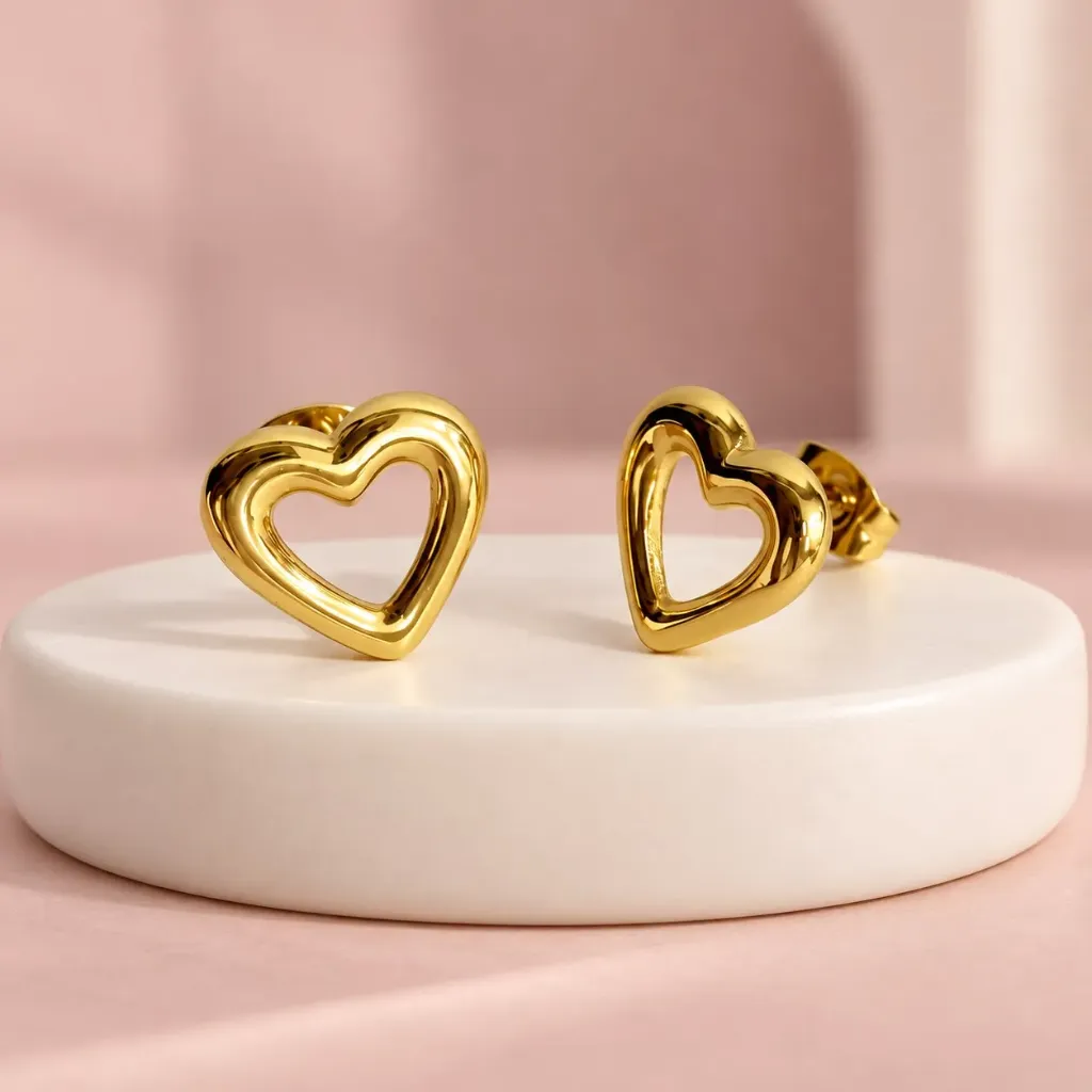 Topo en acero inoxidable dorado silueta corazón