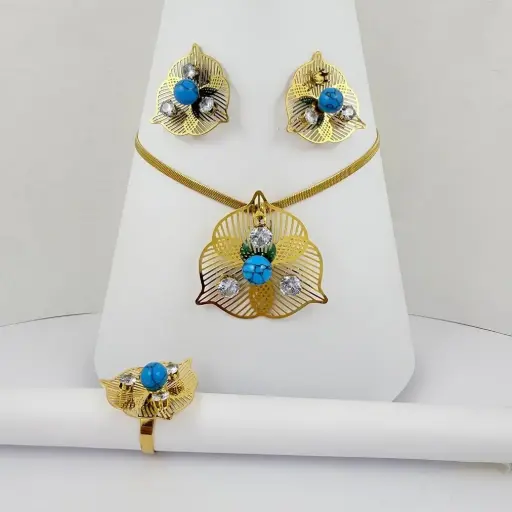 [AC-JU-135] Juego acero gold con anillo flor pétalos piedra turquesa