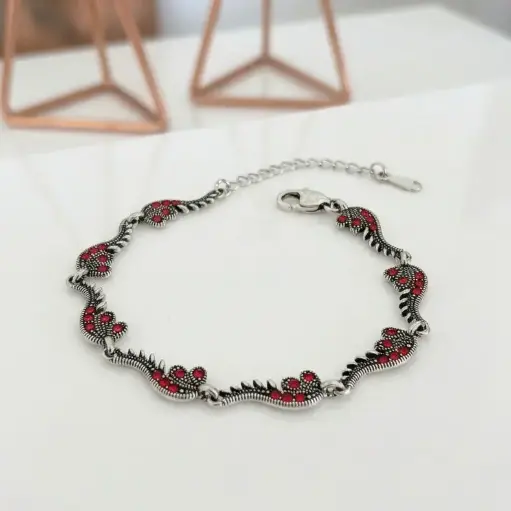 [P-PL-302] Pulsera plata quemada ley 925 marquesita ramitas circones rojos