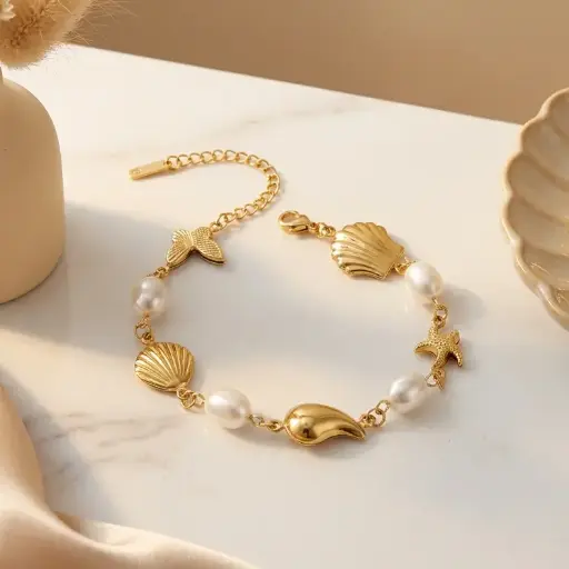 [AC-PL-294] Pulsera en acero gold perlas dijecitos mar
