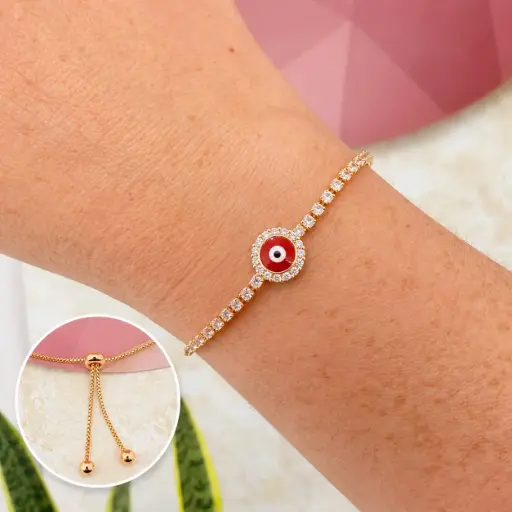 [G-PL-234] Pulsera en Rodinado Gold Champagne ajustable ojito rojo microcirconia
