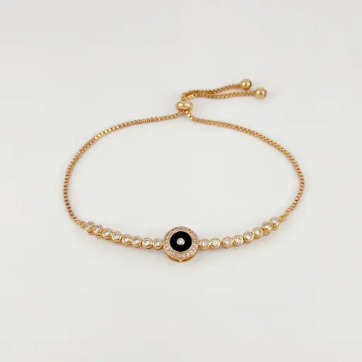[G-PL-242] Pulsera en Rodinado Gold Champagne ajustable ojito esmaltado negro microcirconia