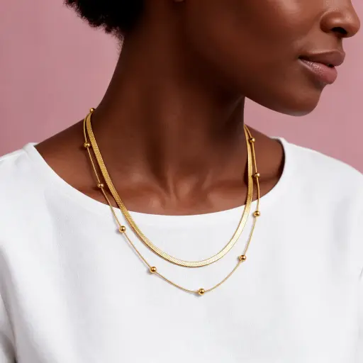 [AC-CDD-227] Collar en Acero Inoxidable dorado doble cadena serpiente / bolitas