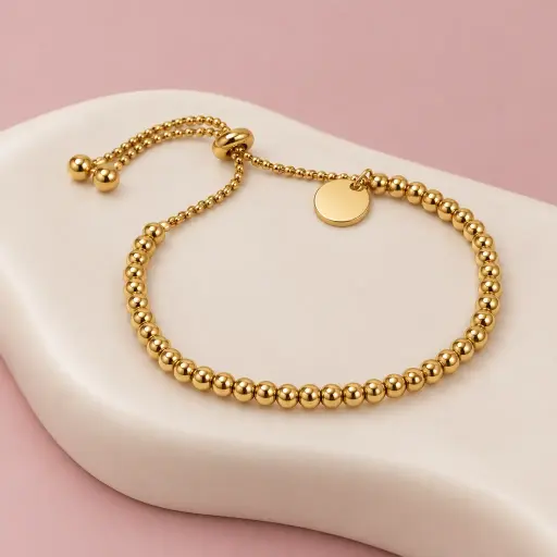 [AC-PL-223] Pulsera en Acero Inoxidable dorada ajustable bolitas