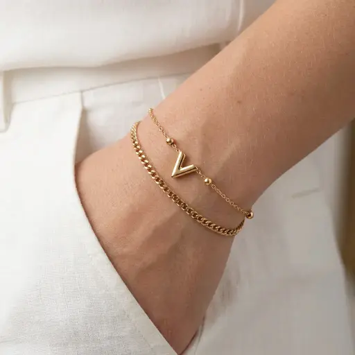 [AC-PL-227] Pulsera en Acero Inoxidable dorada dije V